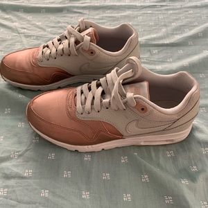 Rose gold Nike sneakers